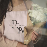 Monogram Pastel Pink Personalized Apron<br><div class="desc">Add a touch of elegance to your kitchen attire with this Monogram Pastel Pink Personalized Apron. Featuring a soft pastel pink hue and a customizable monogram, this apron is perfect for those who love to cook in style. Made from high-quality materials, it offers both comfort and durability, making it ideal...</div>