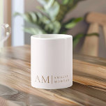 Monogram Personalized Pink Initial And Name  Coffee Mug<br><div class="desc">Enjoy your favourite beverages in style with our Minimalistic Monogram Personalized Pastel Pink Mug. Featuring a soft pastel pink background, this elegant mug is adorned with a sleek monogram initial and your custom name in a modern font. Perfect for coffee, tea, or hot chocolate, this mug combines functionality with a...</div>