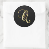 Monogram Q gold script