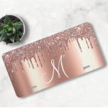 Monogram Rose Gold Metallic Glitter Drips License Plate<br><div class="desc">This design may be personalized in the area provided by changing the photo and/or text. Or it can be customized by clicking Personalize this Template and then choosing the click to customize further option and delete or change the colour of the background, add text, change the text colour or style,...</div>