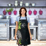Monogram rustic food vegetables herbs apron<br><div class="desc">Fresh food, herbs, basil onions, herbal chopper on a painter's dark rustic canvas with paint stains. Personalize and add your monogram initial, name. The name is written with a modern hand lettered style script with swashes. To keep the swashes only delete the sample name, leave the spaces or emoji's in...</div>