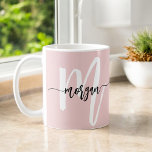 Monogram Stylish Modern Cute Blush Pink Coffee Mug<br><div class="desc">Sip your favourite beverage in style with this Monogram Stylish Modern Cute Blush Pink Coffee Mug. Featuring a sleek and modern design, this mug showcases a soft blush pink background accented with a personalized monogram in elegant script. Its durable ceramic construction ensures long-lasting use, while the comfortable handle makes every...</div>