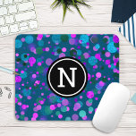 Monogram teal turquoise purple confetti dots bold mouse pad<br><div class="desc">Sparkly turquoise blue, purple, pink, and green confetti dots on a dark teal background adorn this chic, modern monogramed mousepad. Makes a fun and stylish statement every time you use it. A great gift for a friend, as well as yourself! Just type in the initial of your choice and you...</div>