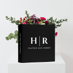 Monogram Wedding Album Classic Chic Minimal White Binder<br><div class="desc">Embrace the timeless elegance of our Monogram Wedding Album Classic Chic Minimal White 3-ring binder as you embark on the journey of preserving your wedding memories. This personalized guestbook is a true symbol of sophistication, adorned with a simple and classic monogram in black and white, featuring the initials of the...</div>