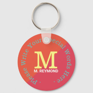 monogram with custom text on two tone reddish keychain