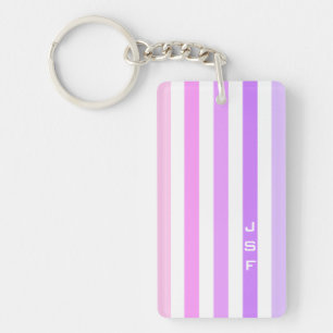 Monogramme à bandes verticales violettes et roses