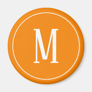 Monogramme blanc sur aimant rond orange