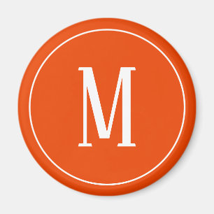 Monogramme blanc sur aimant rond orange brillant