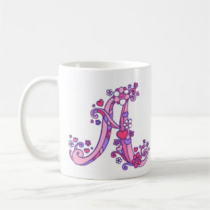 Monogramme décoratif Un coeur et des fleurs tasse