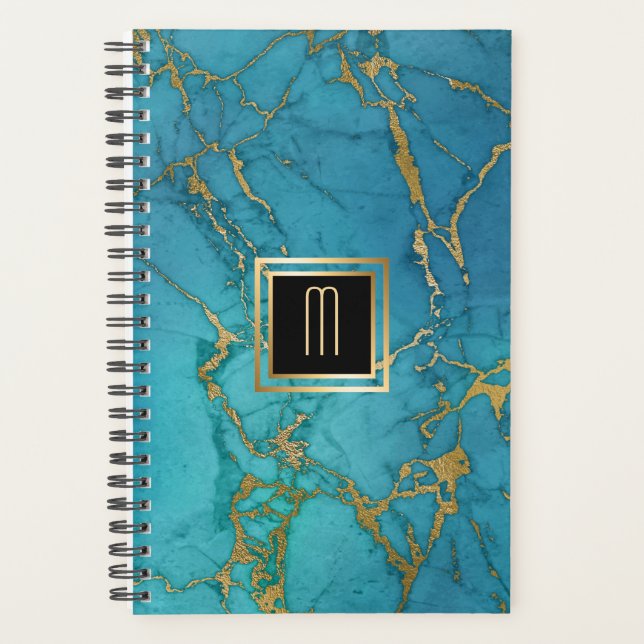 Monogramme doré en marbre bleu (Devant)