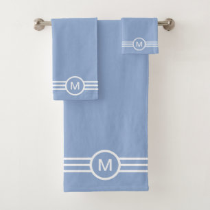 Monogramme et rayures blanches sur fond bleu clair