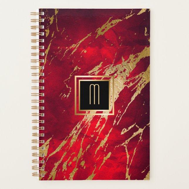 Monogramme or doré en marbre rouge (Devant)
