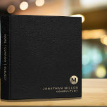 Monogrammed Black Leather Gold Binder<br><div class="desc">Keep your important documents organized with this elegant black leather 3 ring binder featuring a brushed monogram medallion with your name and title in classic block typography. The binder has a luxurious black leather print background and a gold initial monogram that adds a touch of sophistication to your workspace. Perfect...</div>