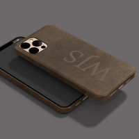 Monogrammed brown faux leather look masculine
