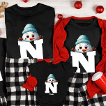 Monogrammed Family Christmas Custom Cute Snowman T-Shirt<br><div class="desc">Celebrate the holiday season with our Monogrammed Family Christmas Custom Cute Snowman T-Shirt. This adorable shirt is perfect for families who want to add a personalized and festive touch to their Christmas celebrations. Our monogrammed family Christmas shirt allows you to customize it with your family members' names, creating a unique...</div>