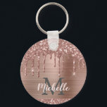 Monogrammed Rose Gold Glitter Drips on Pink Metal Keychain<br><div class="desc">Modern, girly rose gold glitter drips name and monogrammed keychain.This design features blush pink rose gold glitter sparkle drips on pink brushed metal background with custom personalized monogram initial and first name text template. Perfect feminine gift. Please note, this design is printed photo effect. If you need help or matching...</div>