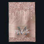 Monogrammed Rose Gold Glitter Drips on Pink Metal Kitchen Towel<br><div class="desc">Modern, girly rose gold glitter drips name and monogrammed kitchen towel. This design features blush pink rose gold glitter sparkle drips on pink brushed metal background with custom personalized monogram initial and first name text template. Perfect feminine gift. Please note, this design is printed photo effect. If you need help...</div>