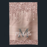 Monogrammed Rose Gold Glitter Drips on Pink Metal Kitchen Towel<br><div class="desc">Modern, girly rose gold glitter drips name and monogrammed kitchen towel. This design features blush pink rose gold glitter sparkle drips on pink brushed metal background with custom personalized monogram initial and first name text template. Perfect feminine gift. Please note, this design is printed photo effect. If you need help...</div>