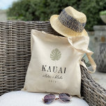 Monstera Leaf Destination Wedding Welcome Tote Bag<br><div class="desc">Welcome guests to your destination wedding with these chic and modern personalized tote bags. Design features a light green monstera leaf illustration with your wedding destination beneath (shown with Kauai) in classic serif lettering. Add your names beneath in handwritten cursive script, as well as the year. Colours can be changed...</div>