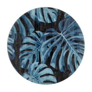 Monstera plant: blue leaves pattern. cutting board