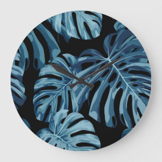 Monstera plant: blue leaves pattern. large clock