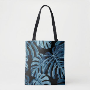 Monstera plant: blue leaves pattern. tote bag