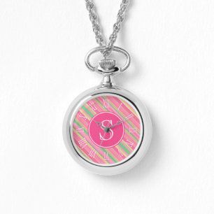 Montre à monogramme graphique à rayures roses et v