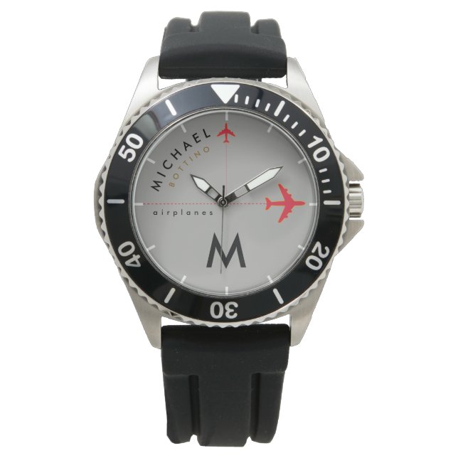 Montre avions rouges avec l'initiale et le nom du pilote (devant)