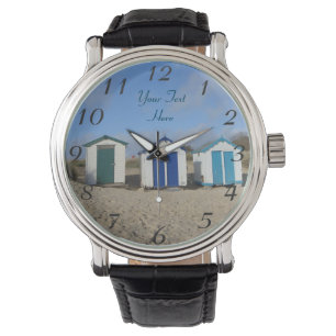 Montre bord de la mer de l'anglais de sable de cieux
