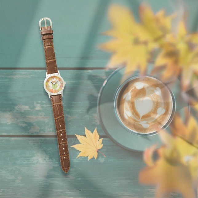 Montre Chat Automne Break (A Fall Break Cat Watch is on the table outside. )