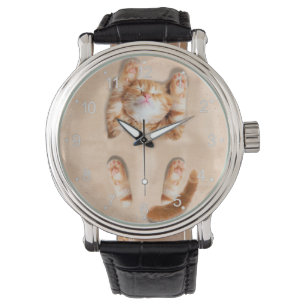Montre Chat enfoui dans le sable
