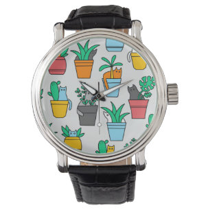 Montre Chats dans les pots à fleurs