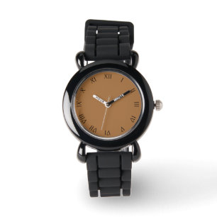 Montre Chiffres romains de script noir sur une eau Brown