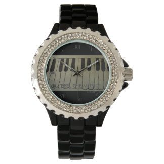 MONTRE CLAVIER AVEC NUMÉRAUX ROMAINS