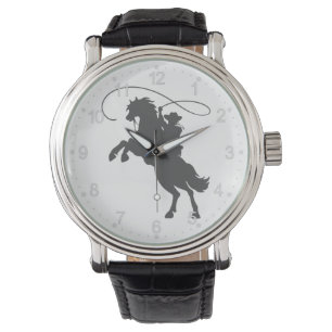 Montre cowboy lançant de l' équitation de lasso élevan