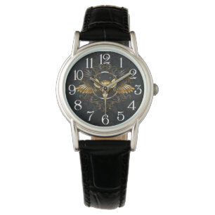 Montre Crâne d'oiseaux dorés sur arrière - plan noir