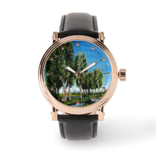 MONTRE DES ARBRES À OISEAUX DANS LE PAYSAGE TOSCANE