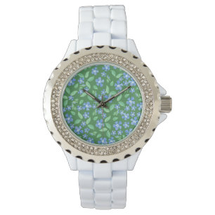 Montre Des bords bleus brillants sur des bords floraux ve