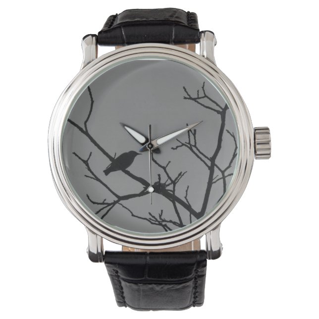 Montre d'oiseau dans un arbre (devant)