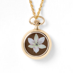 Montre Fleur de lys blanche rayée dorée