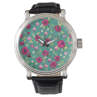 Montre Fleurs rouges sur un arrière - plan vert