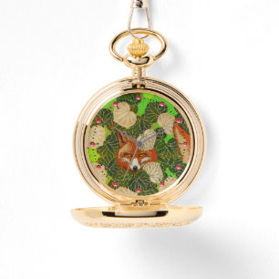 MONTRE FOX ROUGE PARMI LES FEUILLES VERTS ET LE FOLIAGE
