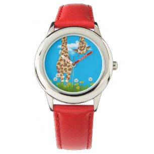 Montre girafe mignonne dans l'herbe et les fleurs