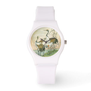 Montre Grues orientales par l'eau