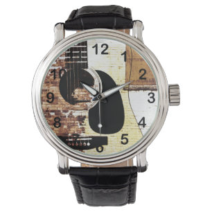 Montre guitare acoustique sur arrière - plan en brique