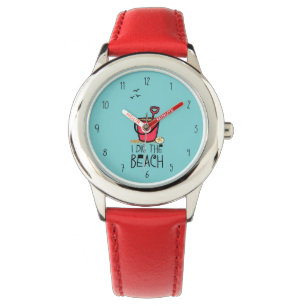 Montre J'ai creusé le seau rouge de la plage