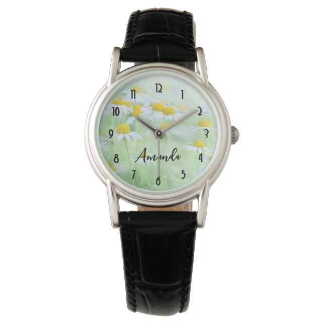 Montre Jolies marguerites dans un champ Photo sur un (devant)