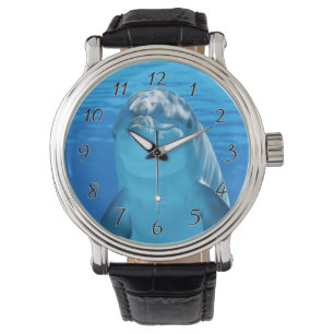 Montre Le dauphin de Bottlenose regarde la caméra sous l'