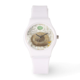 Montre Le nid d'un oiseau avec un oeuf vert