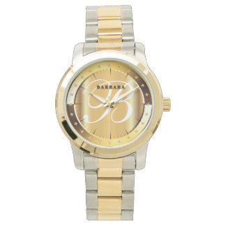 Montre médaille d'or luxe monogramme personnalisé